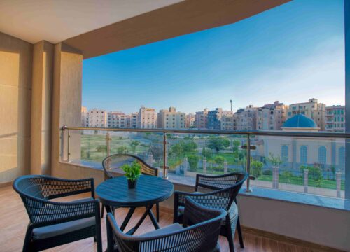 One-Bedroom Apartment with Balcony and City View